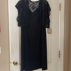 Navy blue jacket with lace trim and detached scalloped lace jacket